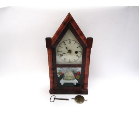 An American New Haven Co Jerome mantel clock in spire case with painted beehive glass front, 37cm tall 