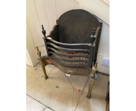 An Adam style fire grate 