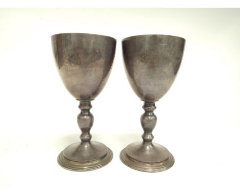 A pair of Garrard and Co Ltd silver goblets, hallmarked for 1977, London. Monogram to bowls. 15cm high, 387g 