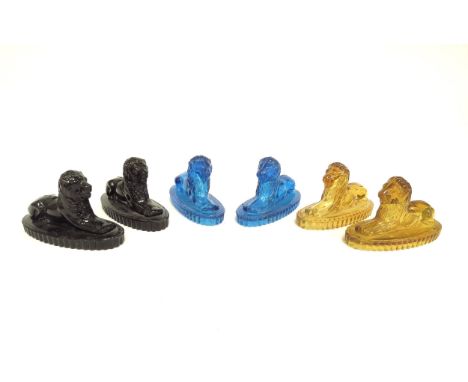 Three pairs of John Derbyshire pressed glass models of dogs in blue glass, light amber and dark amber/brown, 6cm tall 