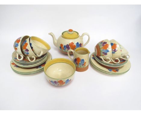 A Clarice Cliff Crocus pattern tea set for six places comprising of teapot, milk jug, sugar bowl, six cups, six side plates a