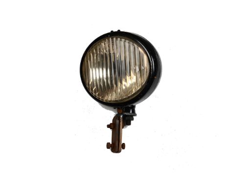 Motoring , a large "Notek" Drive Master lamp, with 21cm oval lens and black painted brass shell on single mounting bracket to