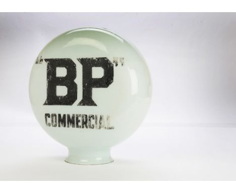 Motoring-a pump globe, a "BP Commercial" flat circular example, with black lettering to front and rear. Heavy paint loss/fadi