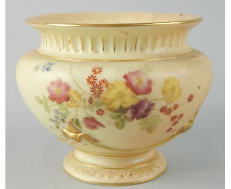 A Royal Worcester porcelain vase, painted with flowers, picked out in gilt, on a blush ivory ground, printed mark in green to