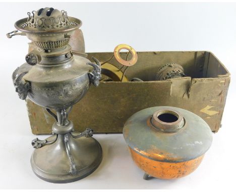 A late 19thC metal oil lamp base, 35cm high, raised with satyr head, a quantity of various other brass oil lamp accessories.