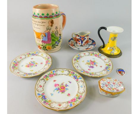 A collection of Continental ceramics, to include a Liezen tankard decorated with two ladies fighting over a man, Noritake jug