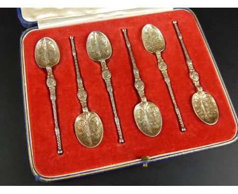 A set of six commemorative silver George VI spoons, in a Celtic style design, embellished in gilt, Sheffield 1937, in present