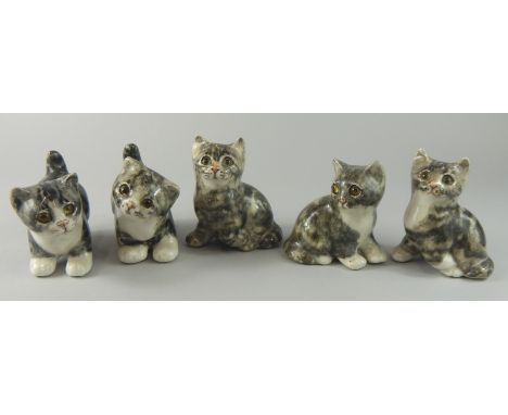 A set of five Winstanley ceramic kittens, each with glass eyes, the largest 12cm high
