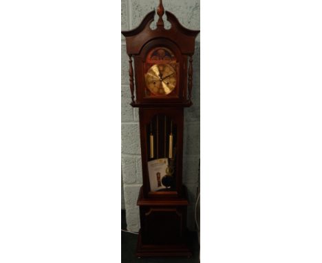 A modern granddaughter longcase clock, in a mahogany case, the arched dial stamped Lincoln, 158cm high