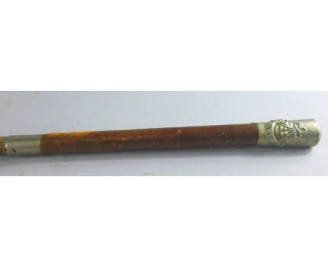 An early 20thC leather swagger stick, with chrome plated top raised with horn and rope twist.