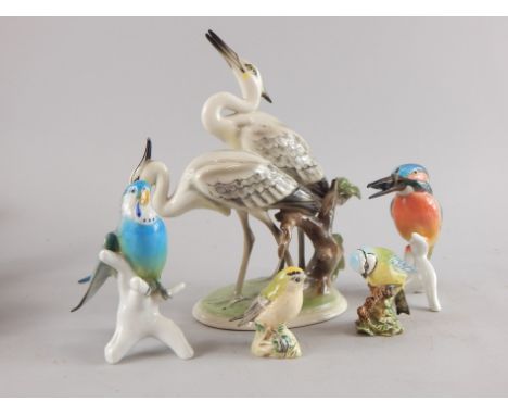 An Austrian ceramic model of two storks, various other birds, to include Beswick and German examples