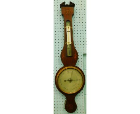 A late 19thC Sheraton style mahogany banjo barometer and thermometer, with broken pediment top and shaped case, the silvered 