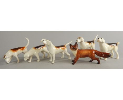A collection of Beswick hunting animals, a fox and five hounds, one hound (AF).