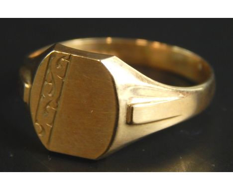A 9ct gold signet ring, with floral engraved shield, 3.1g all in. 