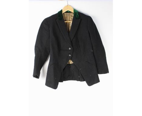 A Tynedale Hunt Club ladies hunting jacket, with two small and six large buttons, marked Tynedale Hunt club and with fox head