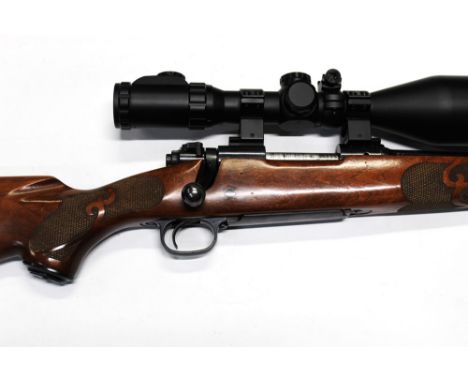 A Winchester Model 70SA cal 22 - 250 Remington, fitted with a Nielsen Sonic 45 sound moderator and a Nikko Sterling 3-12 x 56