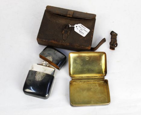 W Thornhill & Co London, a leather flask and sandwich tin box, opening to reveal sandwich tin and flask, silver plated with g
