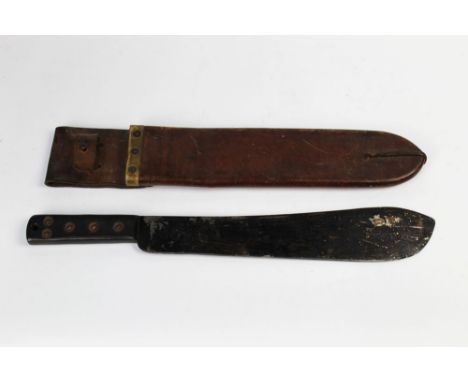 A military issue machete, the blade stamped with a broad arrow and Serial No. KE3277, dated 1952 with sheath.  This bladed pr