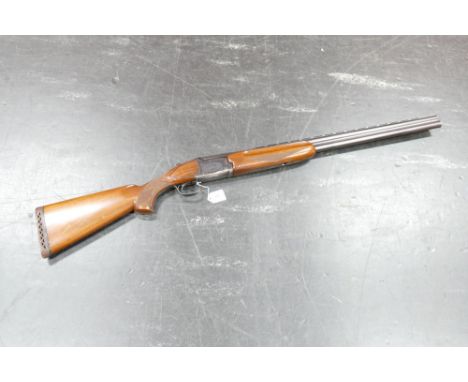  A Winchester Model 101XTR lightweight 12 bore over under shotgun, with 28" barrels, improved and cylinder choke, 70 mm chamb