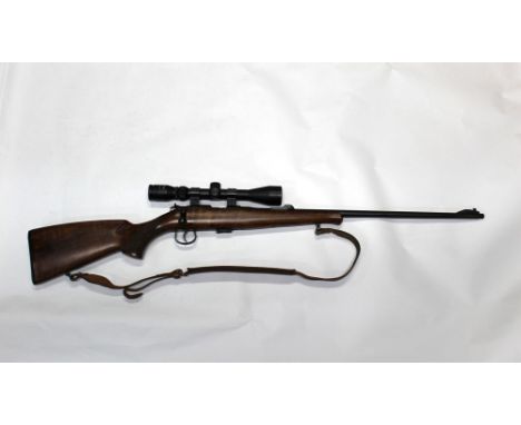 A Brno Model 2-E-H cal 22 LR bolt action rifle, with screw cut barrel, detachable five shot magazine and fitted with a Nikko 