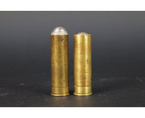 Two Kynoch 14 bore metallic shotgun cartridges, loaded with solid slugs.  FIREARMS CERTIFICATE REQUIRED.  WE CANNOT POST AMMU