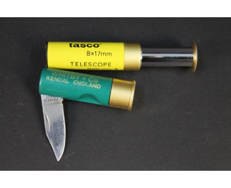 A Tasco 8 x 17mm telescope in the form of a shotgun cartridges, together with a Whitby & Co of Kendal shotgun cartridge pocke