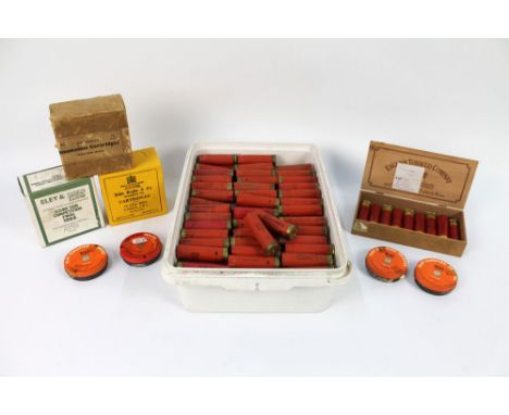 A box of once fired Eley Grand Prix cases, with four hundred Eley Surefire primers, and twenty five John Rigby 12 bore shotgu