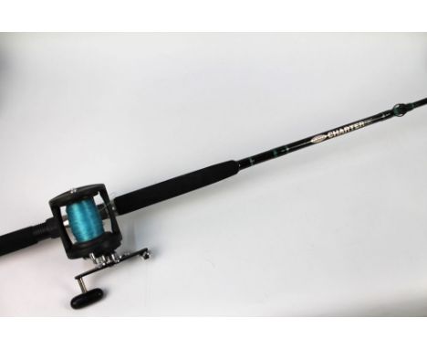 A Fladen Charter boat rod, in two sections, 6' 5" fitted with a Daiwa Sealine SL 250H multiplier.