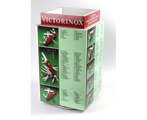 Victorinox Swiss Army Knife rotary shop display cabinet, depicting 20 folding pocket knives with four cupboard doors with she