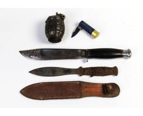 A William Rogers fixed blade Bowie type knife, with 7 3/4" blade, 32 cm overall, together with a hand grenade casing, Whitby 