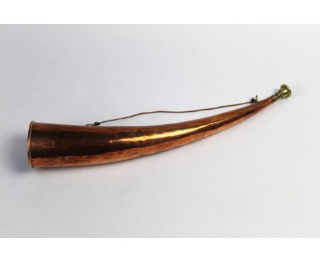 A brass and copper hunting horn, made by Ronnie Wise who worked at The Keswick School of Industrial Arts (K.S.I.A.) FROM 1934