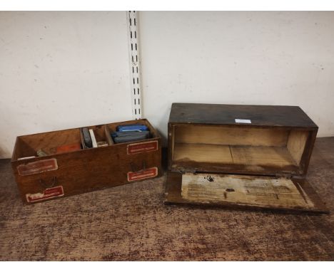 A 1917 wooden first aid box, with paper instructions and contents