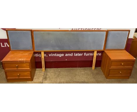 A G-Plan teak headboard and a pair of bedside chests 