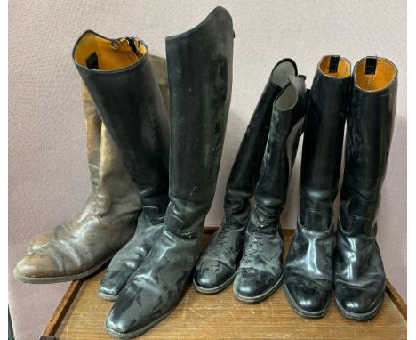 Four pairs of vintage leather riding boots and treen trees 