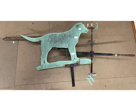 A wrought iron dog weather vane 