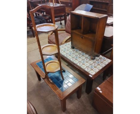 Two oak and tile topped coffee tables, an oak folding cake stand and a small cabinet