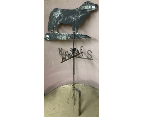 A wrought iron dog weather vane 