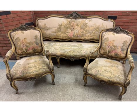 A 19th Century French Louis XV style cream, parcel gilt and tapestry upholstered three piece salon suite, comprising canape s