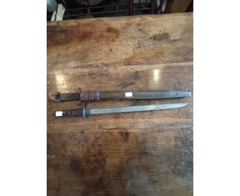 WW1 era US Forces Remington M1917 Rifle bayonet. Correct markings "Remington" 1917,exploding bomb etc. Complete with leather 