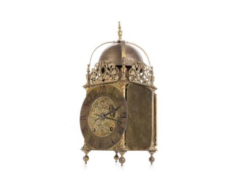 BRASS LANTERN CLOCK, OF CHARLES II DESIGN with twin train eight day movement striking on two bells, Roman numeral chapter rin