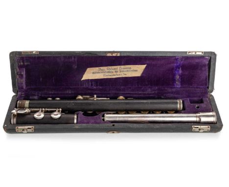 AUGUST RICHARD HAMMIG, FLUTE, EARLY 20TH CENTURY numbered 2221, and stamped maker's mark, in darkwood with silver plated keys