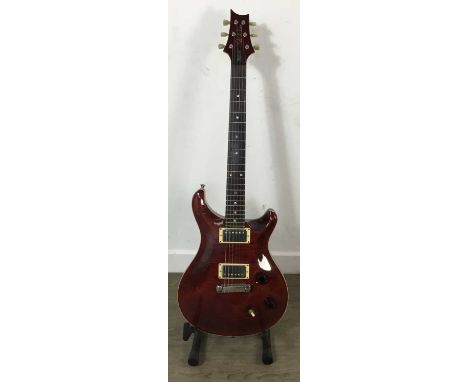 AMERICAN PRS MCCARTY ELECTRIC GUITAR, 2002 serial 264644, black cherry body, with original hard shell case96cm long