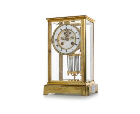 FRENCH BRASS MANTEL CLOCK, LATE 19TH / EARLY 20TH CENTURY with two train eight day movement by Marti Bros., striking on a bel