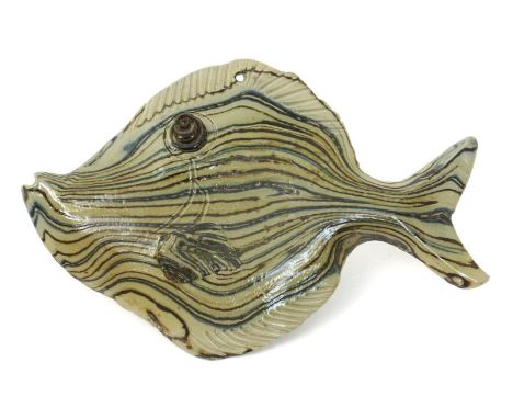 A pottery flat fish by Guy Sydenham,  modelled with striations of coloured clay, incised fins and eye, and five Poole Atlanti