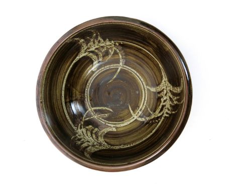 ‡ David Leach OBE (1911-2005) a large Lowerdown Pottery stoneware Foxglove footed bowl, resist decorated in ochre glaze, impr