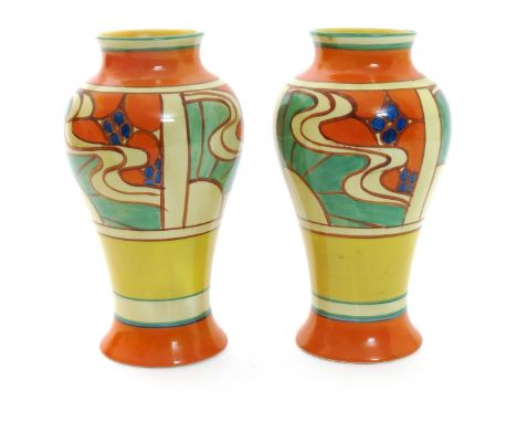 'Sunrise' a pair of Clarice Cliff Fantasque Bizarre Mei Ping vases, retailed by Lawley's, painted in colours between orange, 