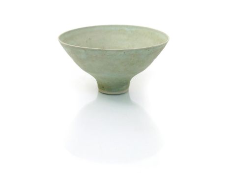 ‡ Dame Lucie Rie DBE (1902-1995) a flaring porcelain bowl, covered to the foot with a pale blue and buff banded glaze, impres