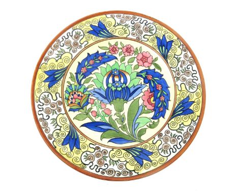 A Burleigh Ware Persian charger designed by Charlotte Rhead,  pattern 4013, tubeline decorated with a Persian flower to the w