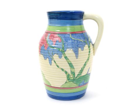 'Rudyard' a Clarice Cliff Bizarre single-handled Lotus Jug, painted in colours between pink, green and blue bands, printed fa