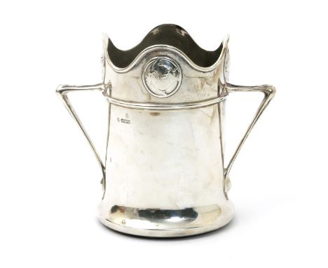 A William Hutton & Son silver wine bottle coaster,  possibly designed by Kate Harris, cylindrical form applied twin-handles, 